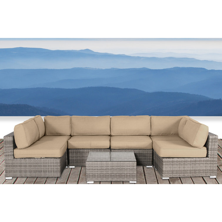 Conner 7 Piece Rattan Sectional Seating Group with Sunbrella Cushions